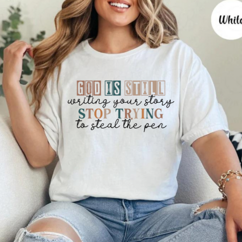 God is Still Writing Your Story Graphic Tee